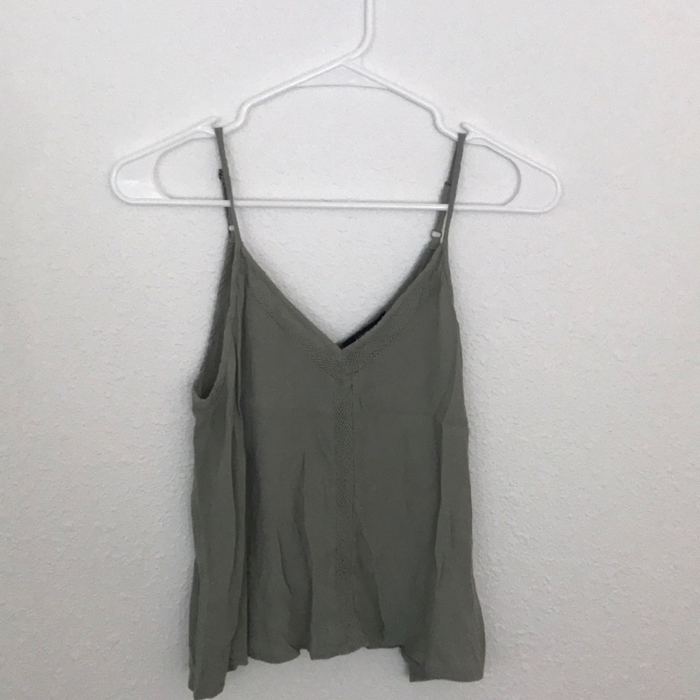 green flowy tank top with mesh detail